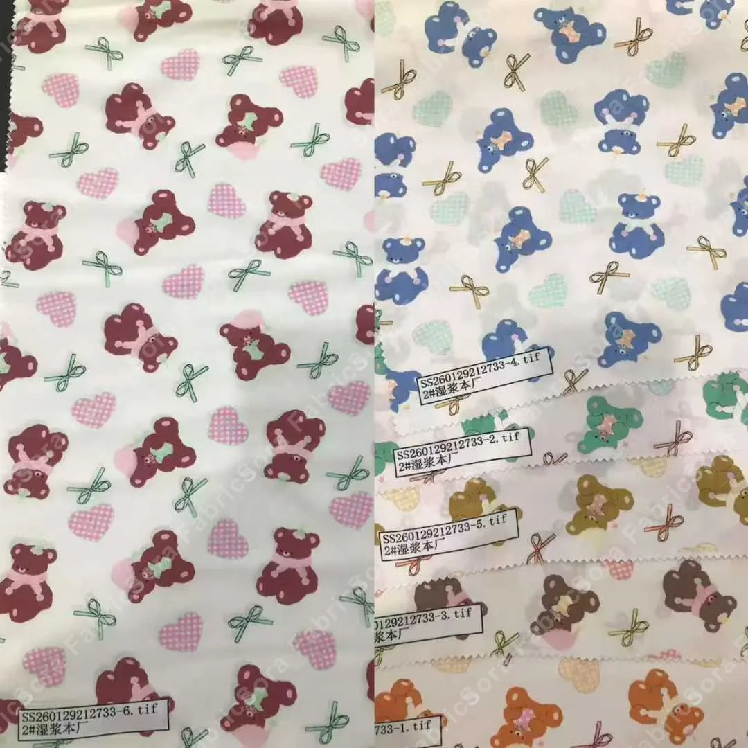 Close-up do tecido cotton infantil mostrando estampa