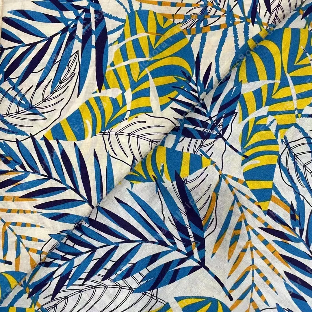 Graphic palm cotton poplin fabric close-up