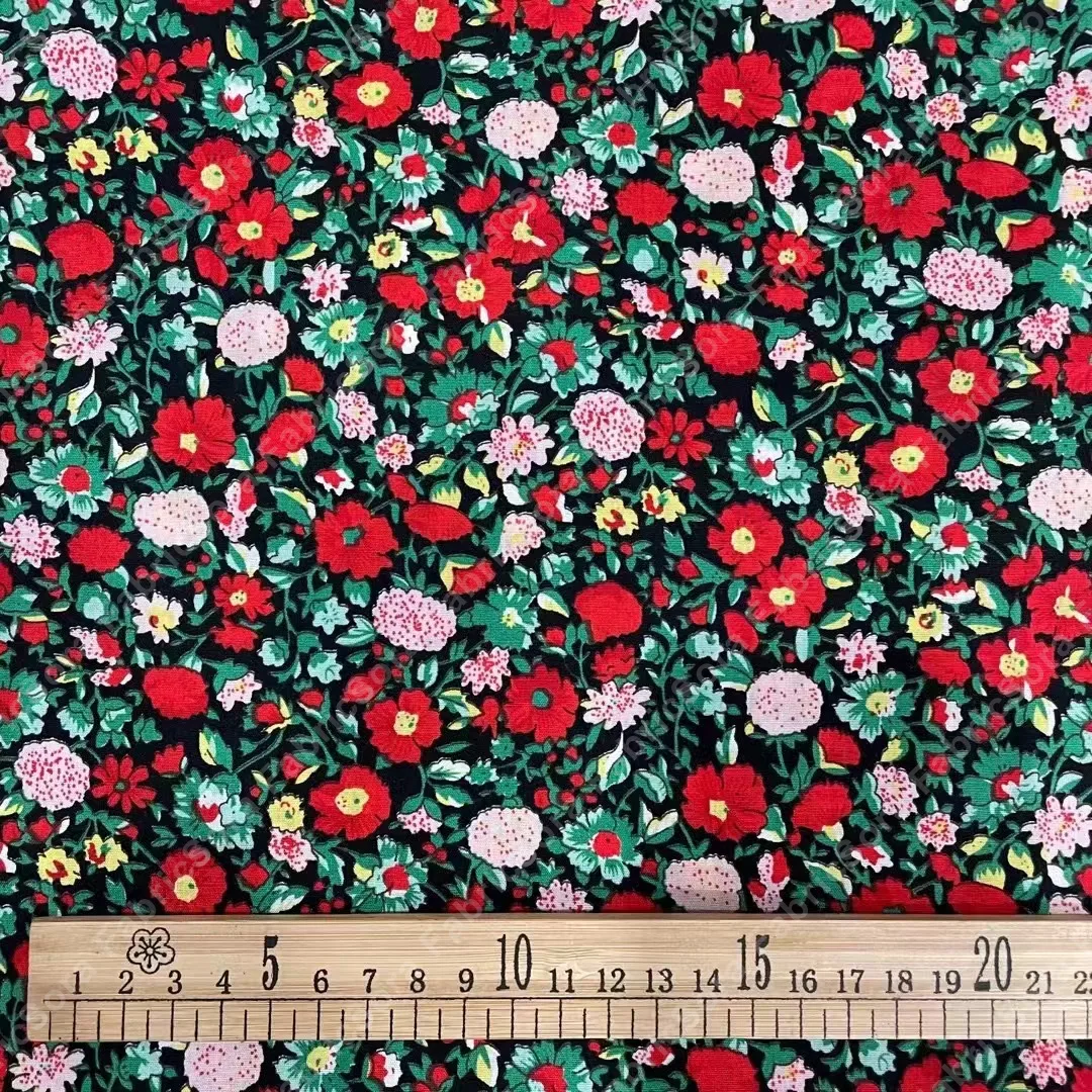 Tissu coton popeline fleurs sauvages sur fond ivoire