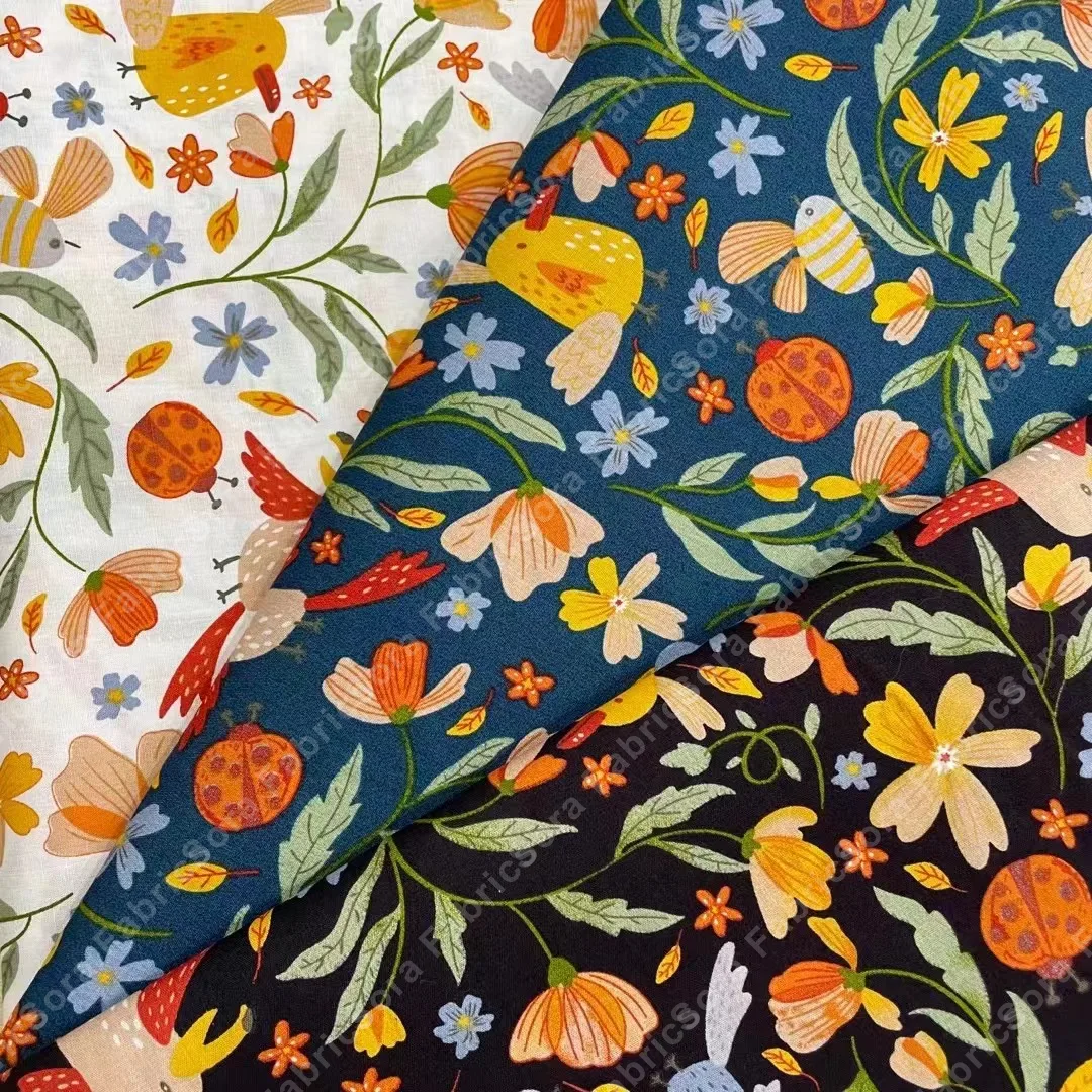 Tissu coton popeline bleu minuit avec motif d'oiseaux