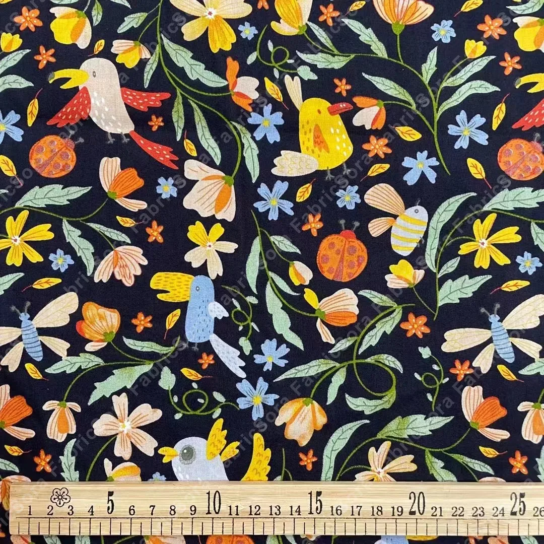 Coton popeline fantaisie sur fond noir pour textiles maison