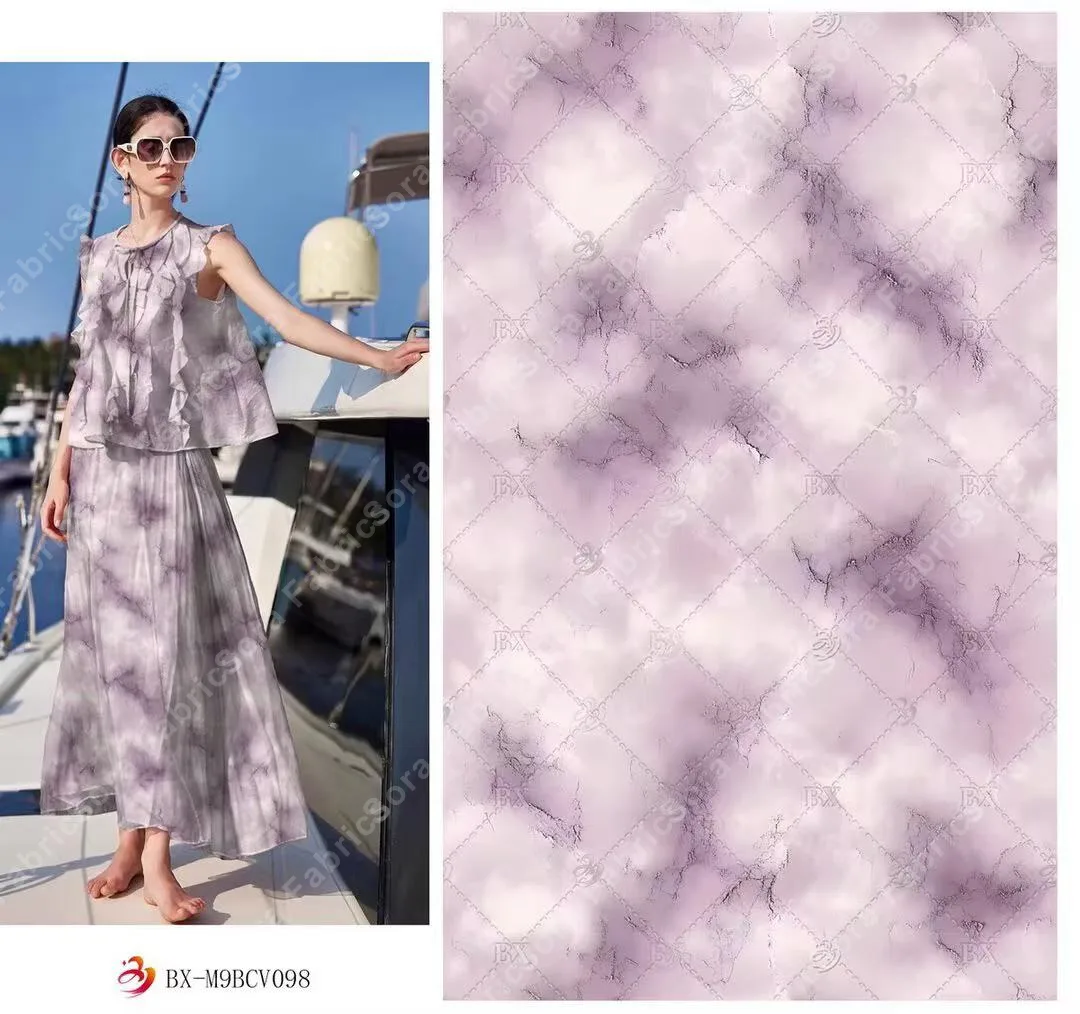 Soft pink watercolor wash rayon fabric close-up