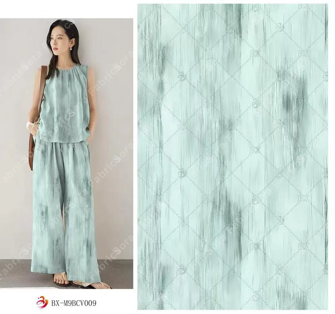 Mint watercolor rayon viscose fabric with soft painterly wash
