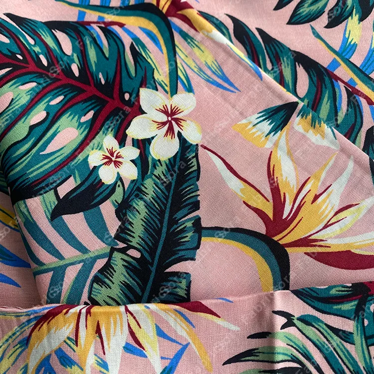 Crimson tropical floral rayon fabric for resort wear